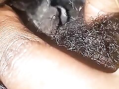 Caressing her humid cock-squeezing pussy