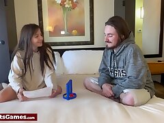 A sexy unite 4 unclothe game featuring a wild couple