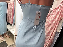 Fitting room. I spy on a big-boobed hotty changing clothes and penetrate her, concluding up in her cooter