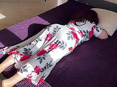 The step-mom lay down on the sofa but the sonnie disturbed her