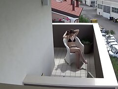 Stagging my nubile neighbour masturbating on her balcony