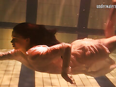 Babes swim and get nude underwater