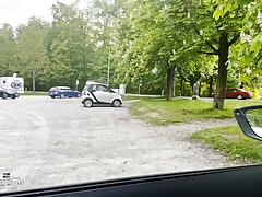 Light-haired honey give handjob in a very frequented parking bunch next to the street :P - realy risky !