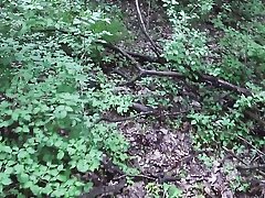 Stagging a luxurious girl masturbating in the forest