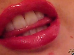 Plus-size honey with big jiggly crimson lip is teasing you with a mirror in this fetish lips video