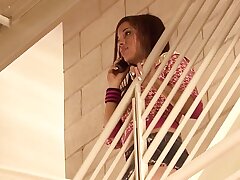 Teen doll in pink socks tearing up