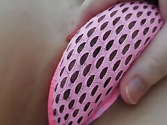 She eventually got her wet, trimmed labia out of her tight bathing suit and toyed until she came.