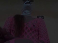 Wearing pink fishnet catsuit and pink platform ankle boots. Rough blow-job