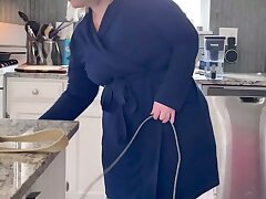 Spy on mother cleaning naked in the kitchen