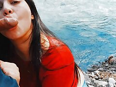 Risky sultry blowjob in nature outdoors.