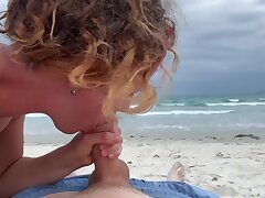 Deep blowjob on the beach, woman in swimsuit deep-throating cock, cum throat outdoors