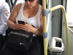 MILF tits juggling on the bus