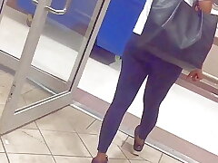 cute mixed gal in ebony stretch pants