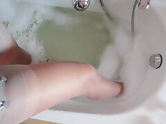 the sub slut of black cocks, takes a bath in stockings2