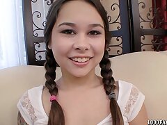 Ponytailed teenager Kira Sinn eagerly taking cum facial