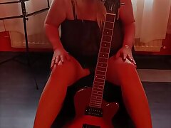 Knockers Next to the Guitar